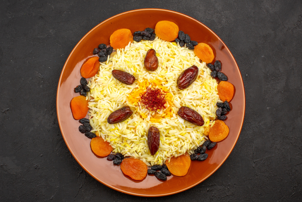 Indian saffron rice cooked effortlessly in a rice cooker. Steamed to perfection, the saffron gives the rice a golden glow and subtle floral notes. An easy and elegant side for your favorite curries.